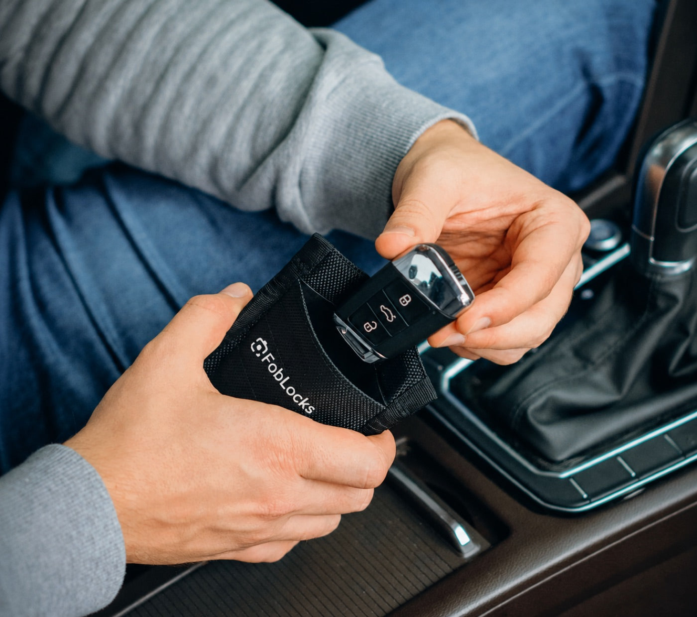Dropping a key fob into the FobLocks pouch